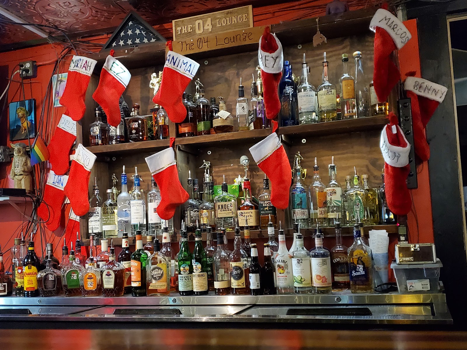 Christmas stockings with regulars' names, Benny's included, hung on the back-bar shelves.